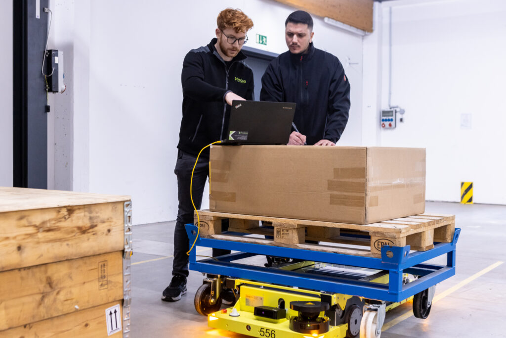 Service technician at the AGV installation of ProLog Automation
